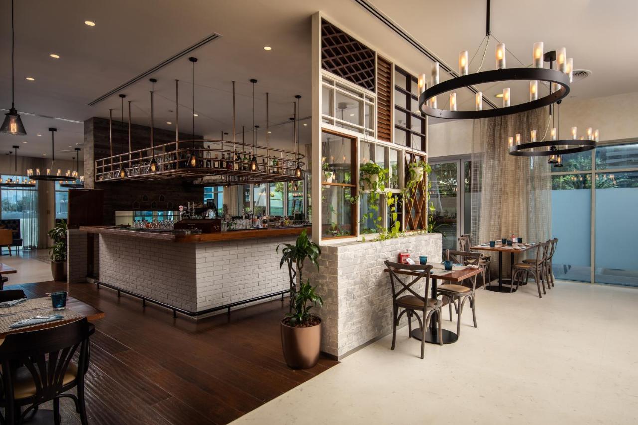 Pullman Jumeirah Lakes Towers Hotel y Residencia Dubái Exterior foto The Bar